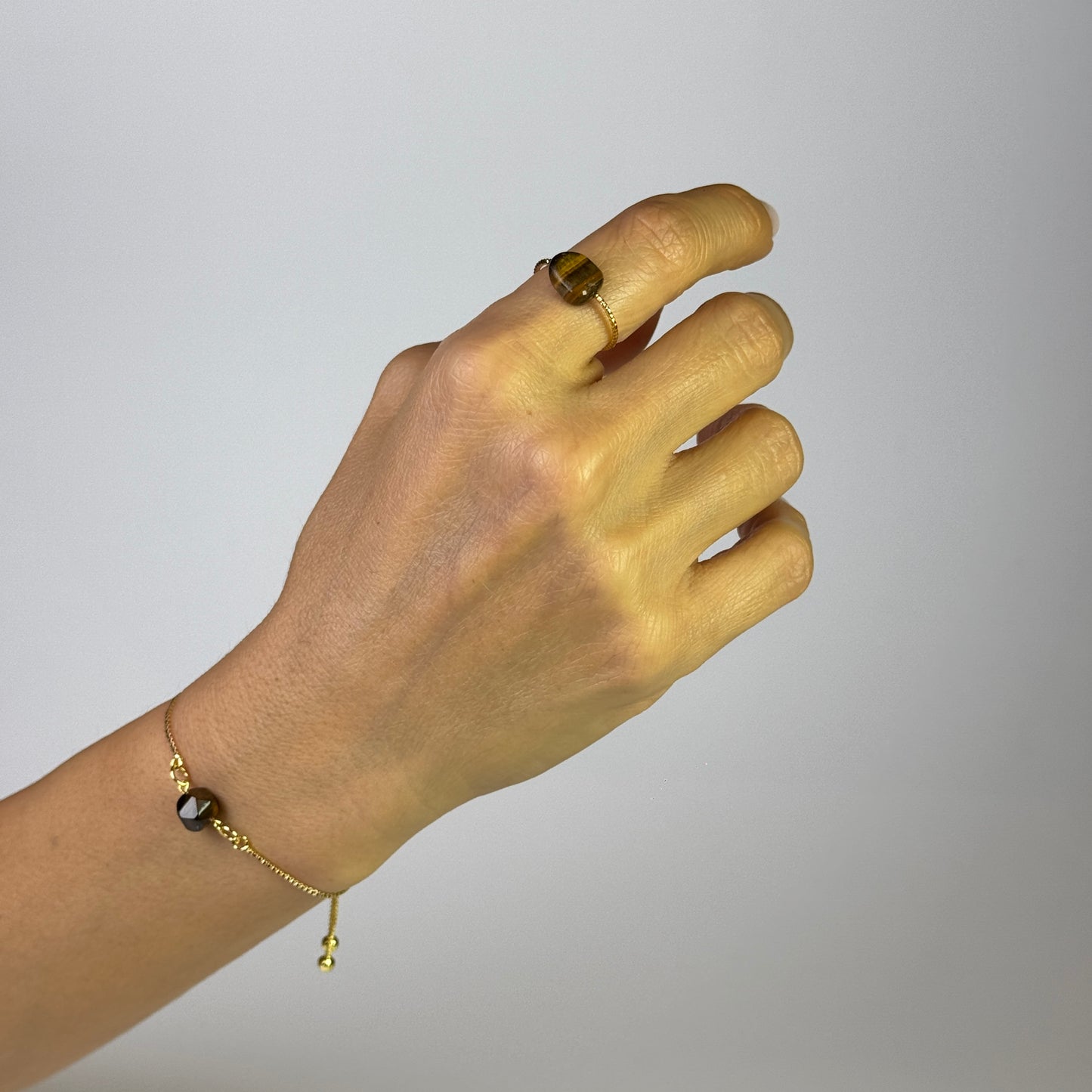 Bundle bracelet with a ring